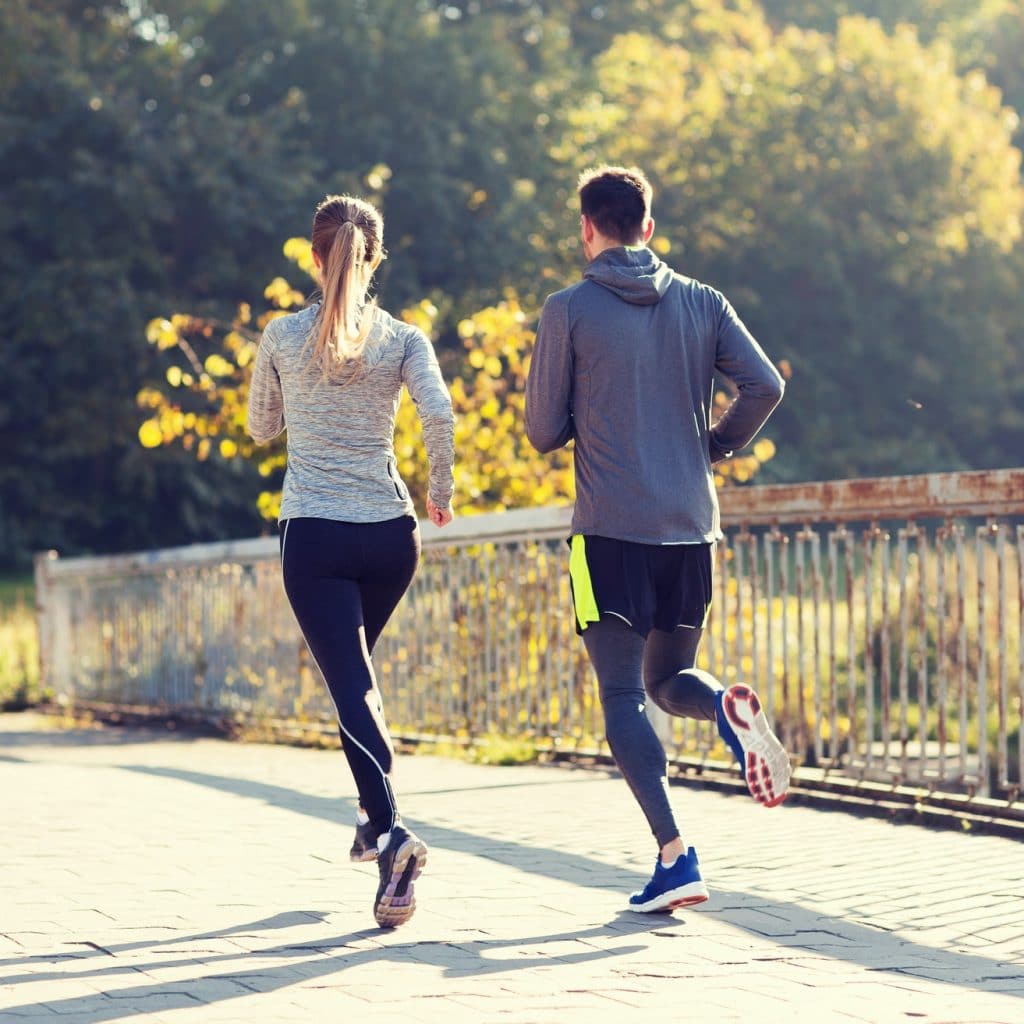 couple running or jogging outdoors
