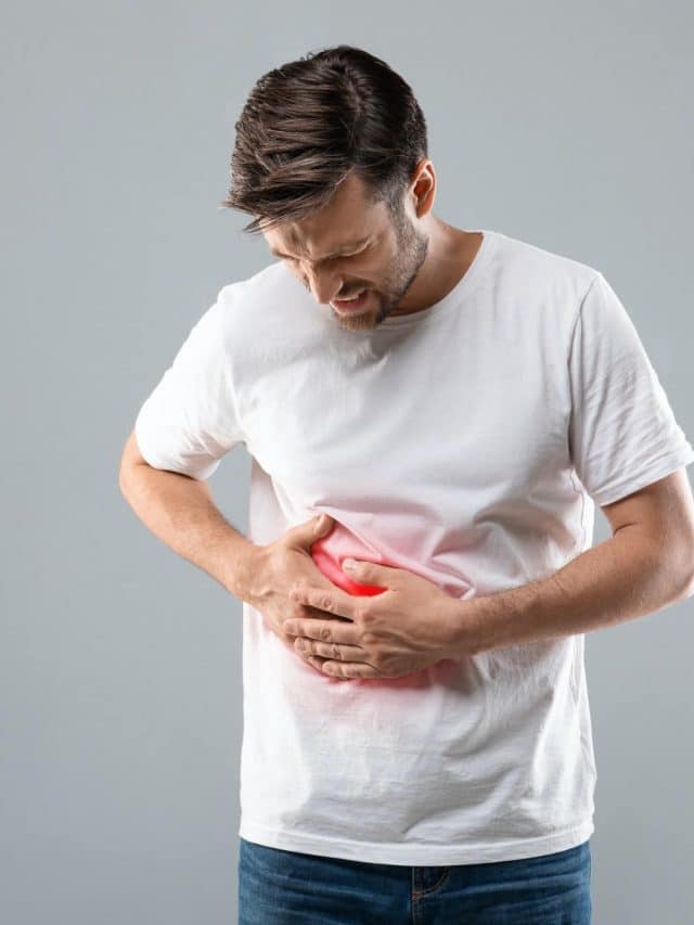 cropped-man-holding-his-right-side-suffering-from-liver-pain.jpg